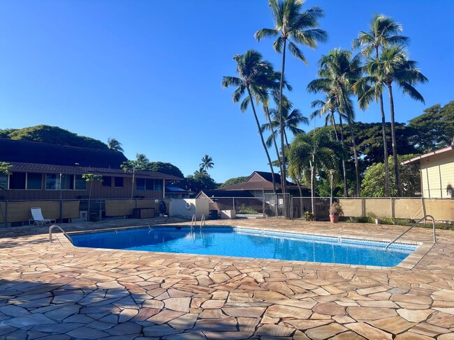 Building Photo - Available Now | 2 Bedroom, 2 Bathroom Townhouse with 1 Assigned Parking Stall at Tropic Gardens 1