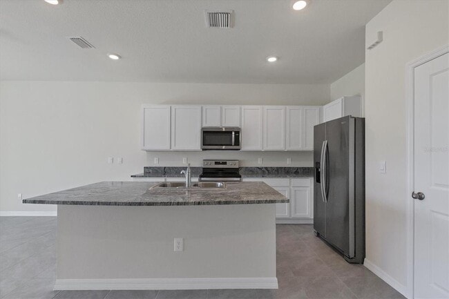 Building Photo - 8525 Milestone Dr
