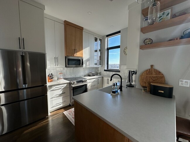 Building Photo - Beautiful 1 Bedroom 1.5 Bath Condo in down...