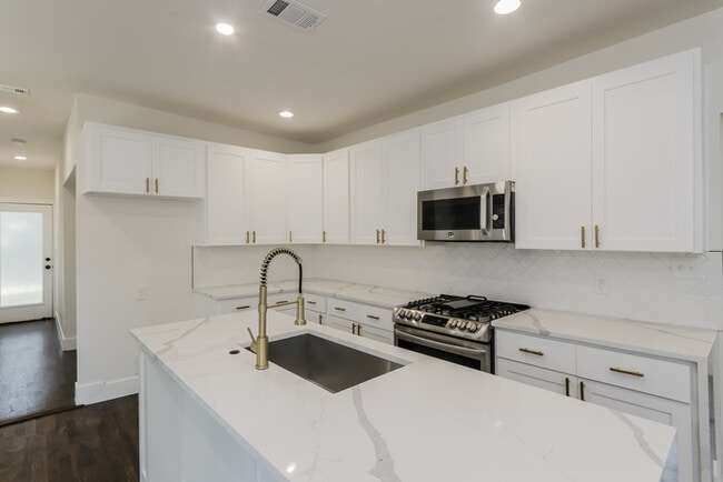Building Photo - Stylish and Modern Living Minutes from Dow...