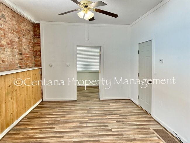 Building Photo - 2 bedroom on the main floor of a duplex on Main St!