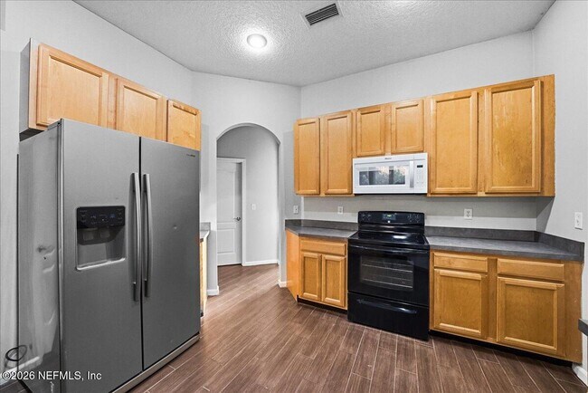 Building Photo - 8871 Canopy Oaks Dr