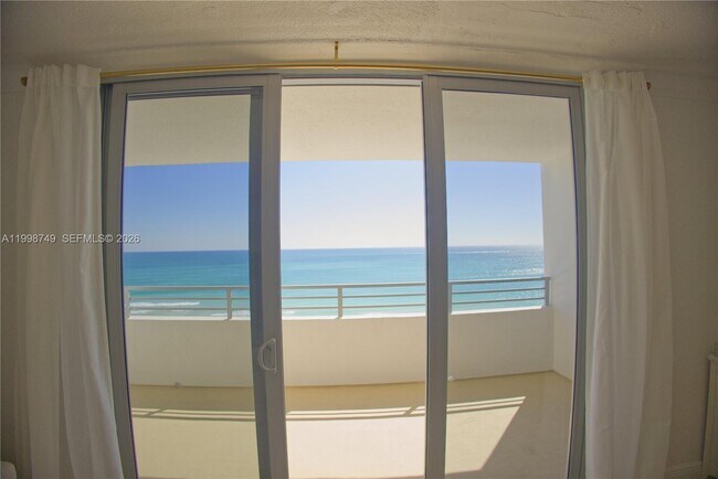 Building Photo - 5555 Collins Ave