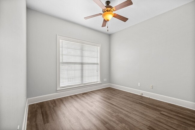 Building Photo - Main-Level Living End-Unit Townhome