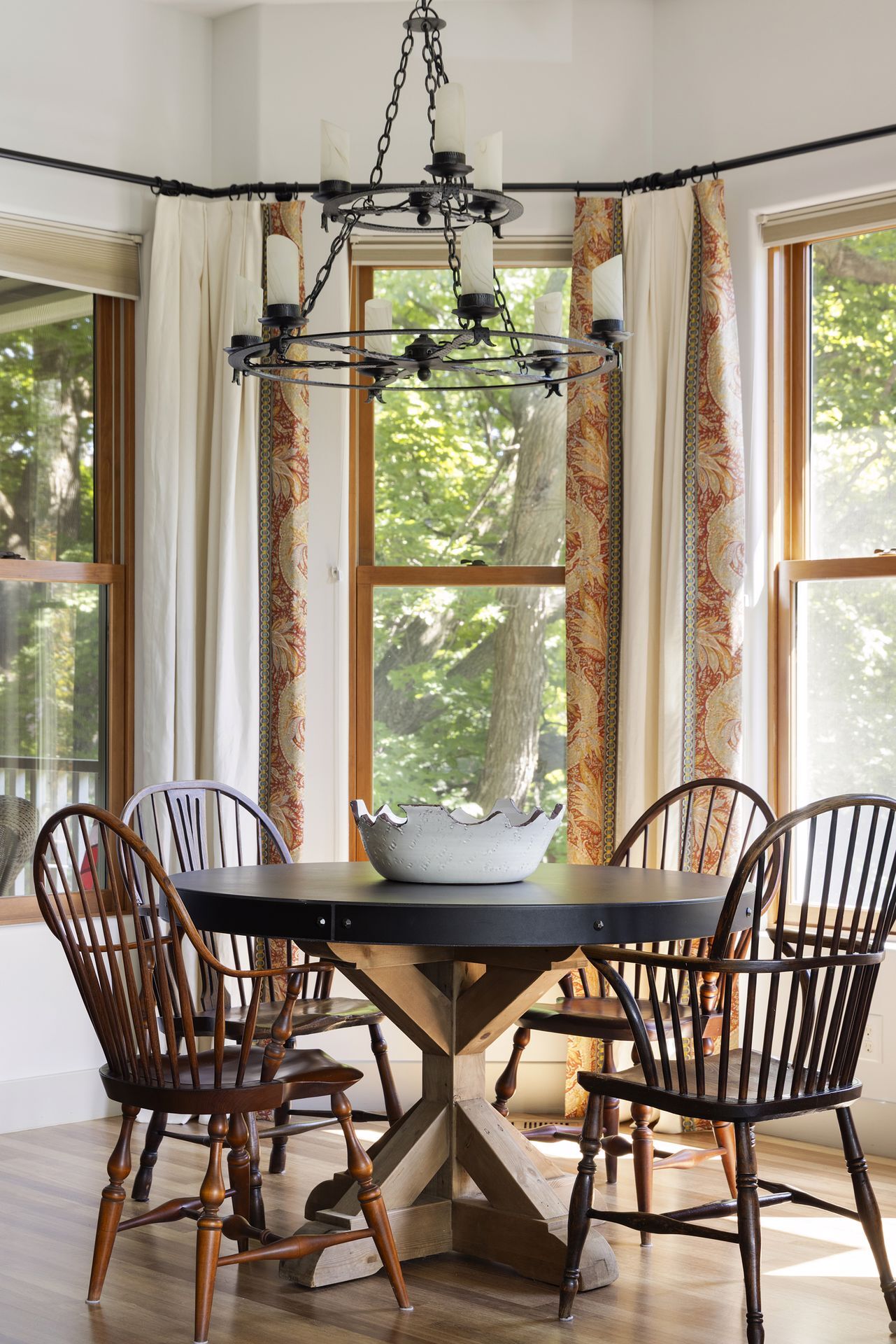 Enjoy effortless dining in the informal dining room with access to the screened-in porch - 745 Rice St E