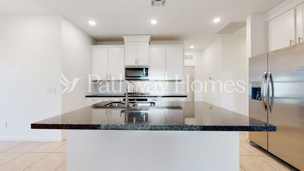 Building Photo - 40369 W Hillman Dr