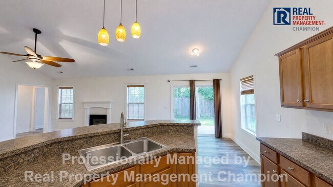 Building Photo - 3BD/2BA home w/vaulted ceilings, fireplace, 2-car garage, deck and fenced backyard