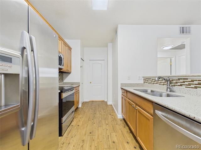 Building Photo - 10239 W 55th Dr
