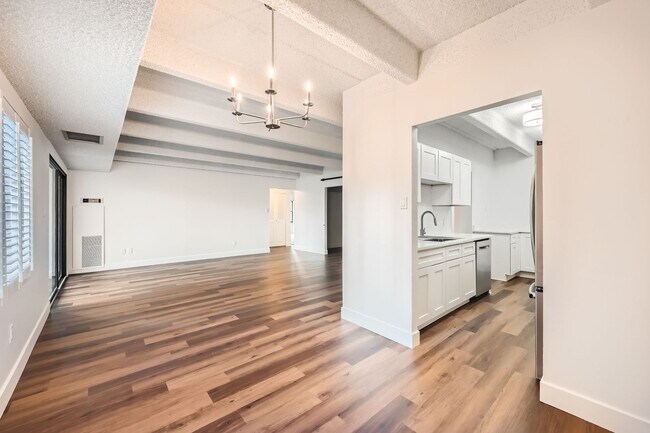 Building Photo - Completely Updated 2 Bedroom 2 Bathroom Condo Available NOW! Garage Parking Included!