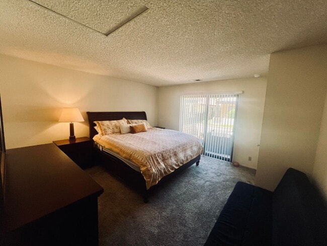 Building Photo - Affordable Comfort in 55+ Guard-Gated Comm...