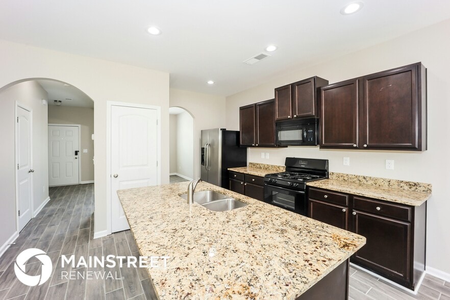 Building Photo - 6372 Woodwell Dr