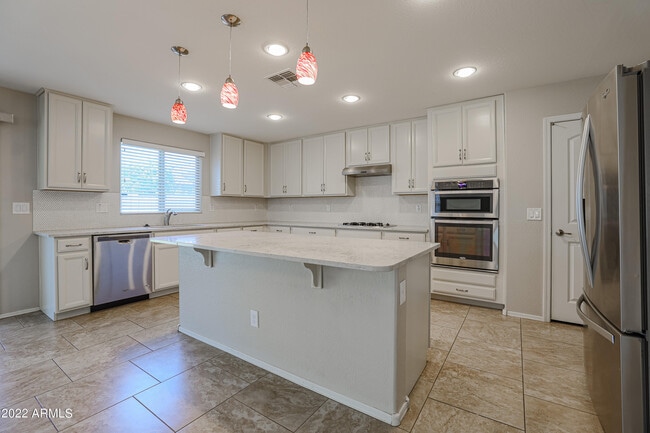 Building Photo - 12108 W Range Mule Dr