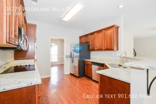 Building Photo - 10279 Woodland Hills Dr