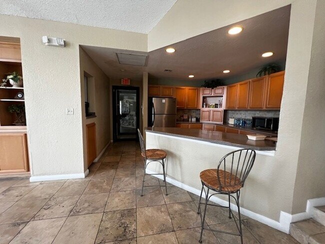 Building Photo - MOVE IN NOW!! Water included! Spacious 3 x2 on 2nd floor with screened in porch!! All tile floors!!