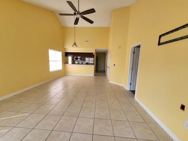 View of dining/living with vaulted ceiling - 4910 Windsor Green Way