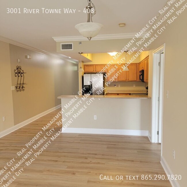 Building Photo - Amazing Riverfront Condo Living!