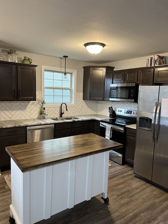 spacious open layout kitchen with island included - 2053 Jackie Lorraine Dr