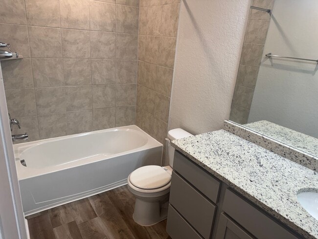 Building Photo - Stylish, Spacious & Close to It All – Your Ideal Townhome Awaits!