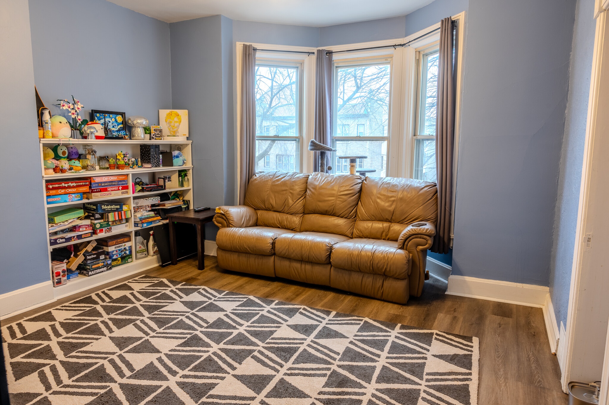 Living room boasting large windows and abundant natural light. - 1534 N Marshall St