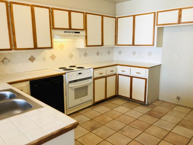 Building Photo - 3 bedrooms, 2 1/2 baths and a 2 car garage...