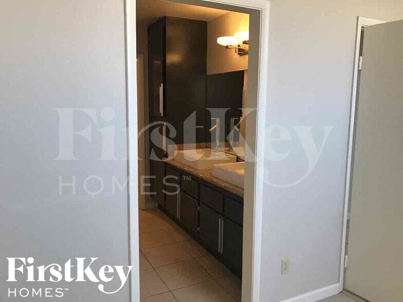 Building Photo - 7080 Magic Moment Ln