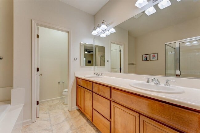 Building Photo - UPGRADED HOME IN HIGHLY CENTRAL SETTING.  RARE 3-BED/3-BATH FLOOR PLAN!