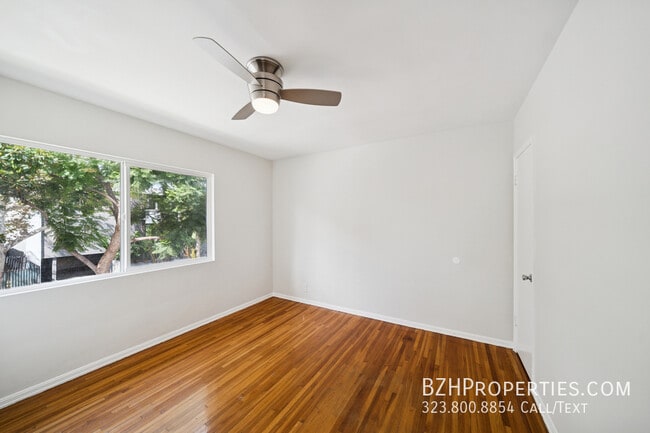 Building Photo - 7571 Willoughby Ave