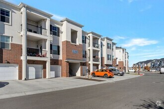 Building Photo - LIKE NEW TOP FLOOR HERRIMAN CONDO - AVAILA...