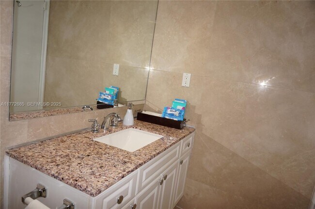 Building Photo - 19380 Collins Ave