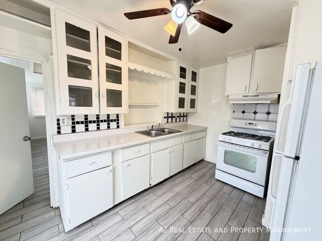 Building Photo - 7210 N 55th Dr