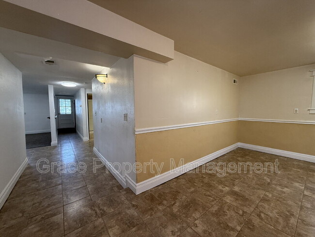 Building Photo - 1149 E 58th Ave