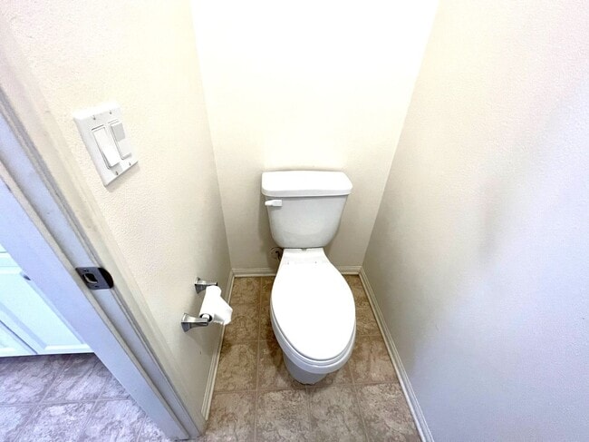 Building Photo - Beautiful 4 Bedroom Condominium with Attached Garage Located in Gated Community of Eastvale