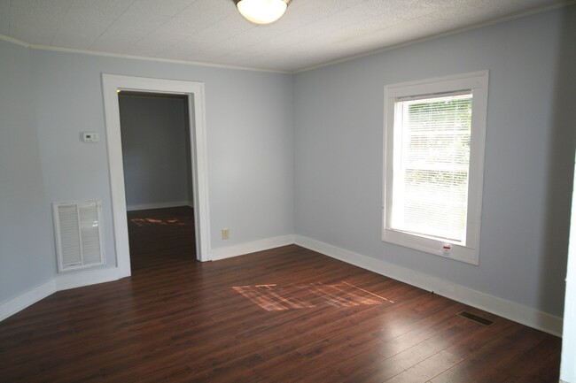 Building Photo - Your Own Home and Yard Centrally Located 3...