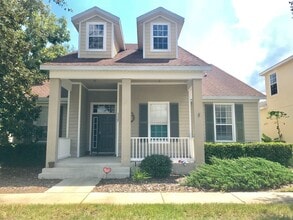 Building Photo - MOVE IN SPECIAL- Charming 3/2 home w/ formal office/4th bedroom and fenced yard in Harmony