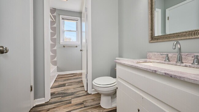 Building Photo - Now Ready : 4BR, 1 1/2BA home with fenced in back yard and storage building.