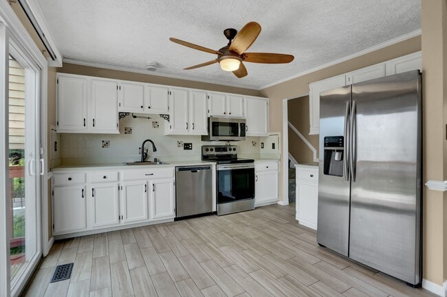 Primary Photo - Spacious 4-Level Home with Deck, Workshop ...