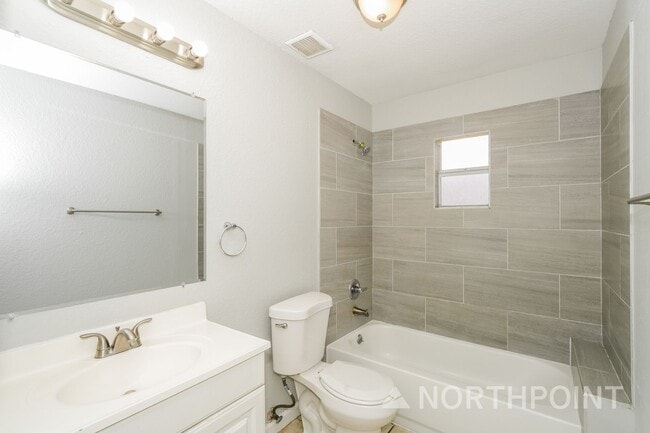 Building Photo - Newly Renovated Single Family Home | 4 BR/2BA | Partially fenced  front yard