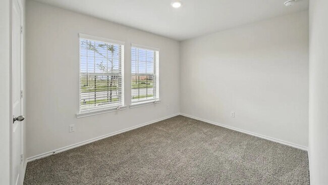 Building Photo - Beautiful new 4-bedroom, 2-bath home with an open floor plan, granite kitchen, two-car garage, an...