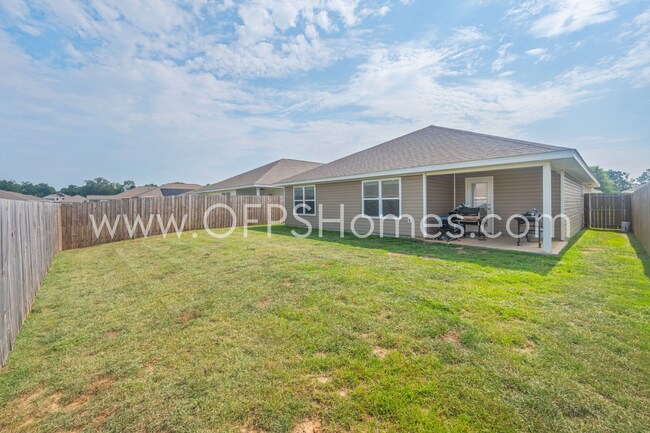 Building Photo - 4/2 in Pace Community!! AVAILABLE SEPTEMBER 2026!