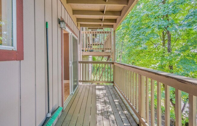 Building Photo - Spacious 2-Bedroom Condo with Forest Views, Private Balcony, In-Unit Laundry & Community Amenitie...
