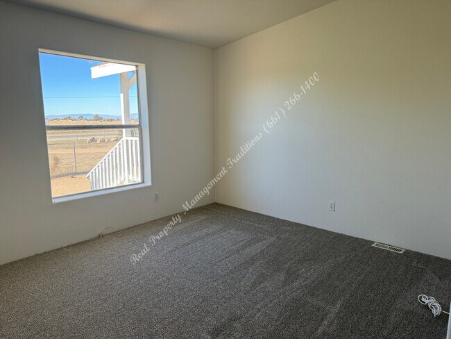 Building Photo - New Year Special! 50% Off First Month's Rent!