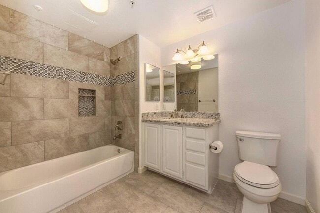 Building Photo - NICE 3 BEDROOM CONDO, 2 BATH, & 2 CAR GARA...