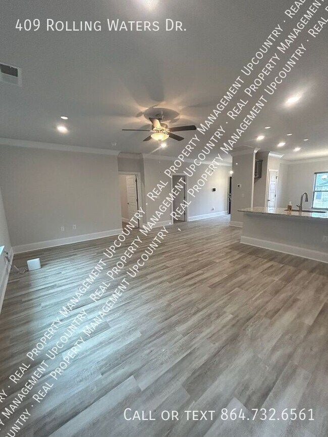 Building Photo - 409 Rolling Waters Dr