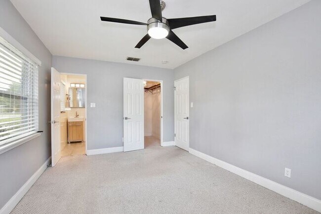 Building Photo - Gorgeous Waterfront 3/2 Mid-century Modern Style Home with a Covered Patio and a Large Backyard i...