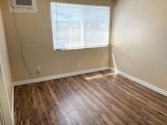 Building Photo - Gated Main House with Private Backyard & Bonus Room