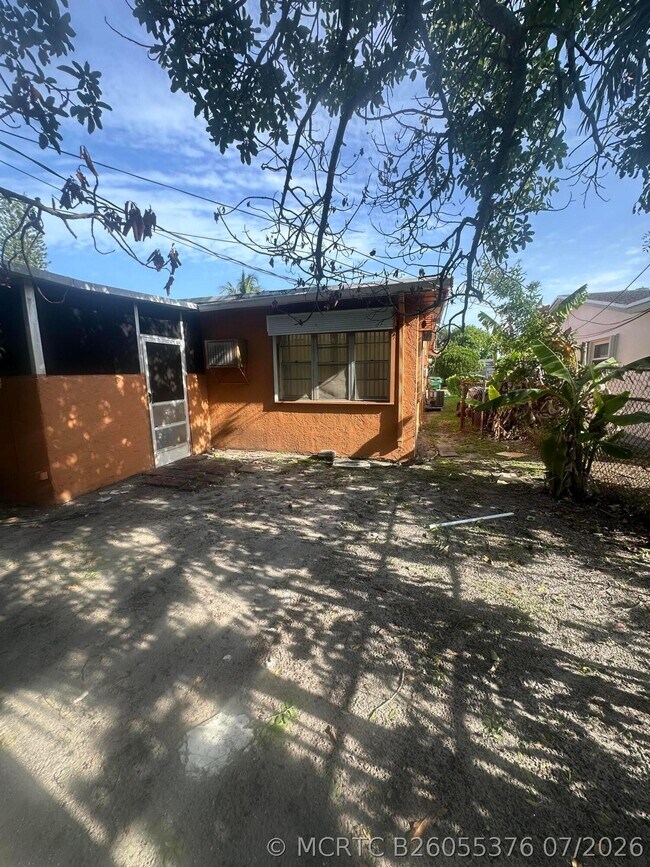Building Photo - 5725 NW 14th Ct