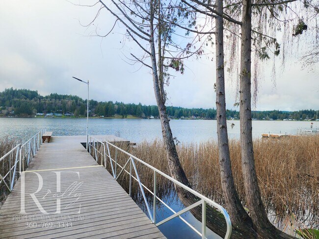 Building Photo - Modern Elegance Meets Tranquil Lakeside Living On Osprey Circle