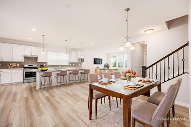 Building Photo - Updated 3-Bedroom Home with 3 Baths, Open-Concept Layout, Luxury Flooring & Bright Modern Kitchen