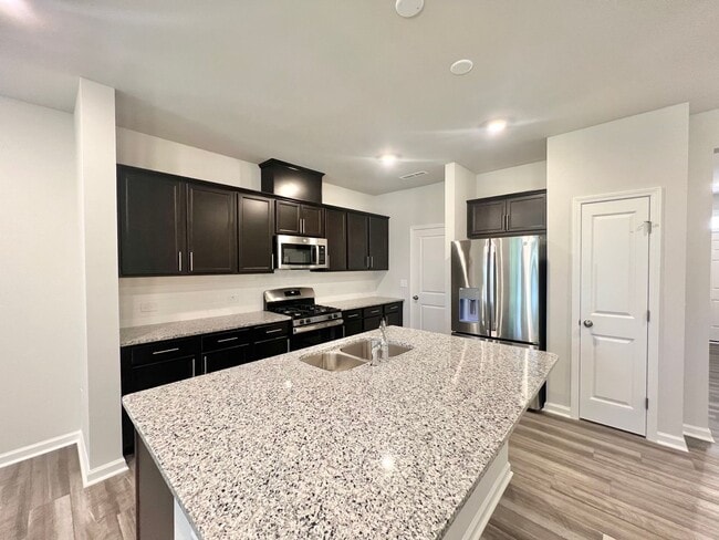 Building Photo - Newly Built 3BD, 2.5BA Raleigh Townhome in...