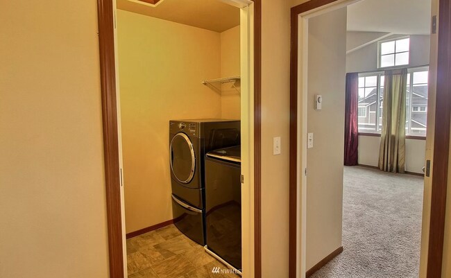 In Unit laundry room - 596 NE Nantucket St